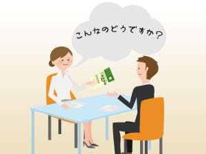 チラシ作成の事で相談するセールスマン